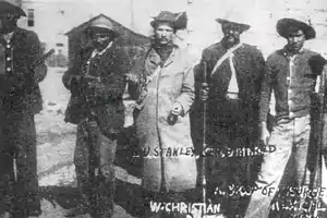 Photograph of Magonista soldiers holding their guns in Mexicali