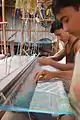 Weaving Jamdani sari in handloom, Bangladesh.