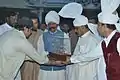 Malik Sher Afzal giving medal to Malik Ata Muhammad Khan at Attock Mela April 2013