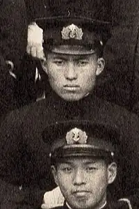 Mamoru Seki in a group photo.