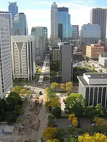 An aerial photo of Marquette Avenue under construction showing the street and nearby buildings.