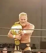 Marshall Von Erich celebrating after winning the MLW World Tag Team Championship