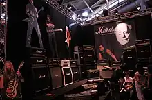 A selection of Marshall guitar amplifiers and speaker cabinets.