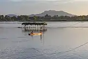 Mekong pirogue at sunset, Don Puay