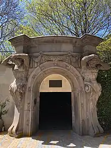 East entrance of the car park, incorporating two Atlas figures, formerly from the Colonial Bank building in Elizabeth Street