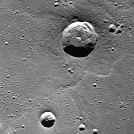 Mendelssohn crater interior.  The crater at top is associated with a dark spot and contains hollows