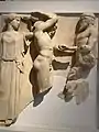 Metope from the Temple of Zeus, depicting the 11th labour of Hercules. In front of Hercules is Atlas and behind is Athena.