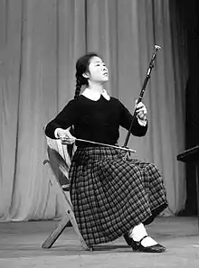 Min Huifen playing the erhu, c. 1963