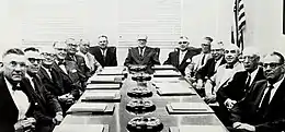 Mississippi's state college board sitting around a long boardroom table