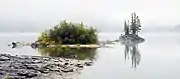 Misty Minnewanka lake in late fall