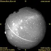 Sky image from the CONCAM at Mauna Kea Observatories on Nov. 18, 2001, showing the long trail of a Leonid meteor