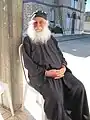 Monk sitting in the sun