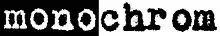 "monochrom" with "mono" white on black background, "chrom" black on white background. The letters are in a typewriter font with diffuse edges formed from very small dots.