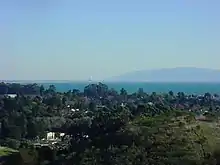 Monterey Bay as seen from Soquel, California.  The Moss Landing power plant is visible in the distance.