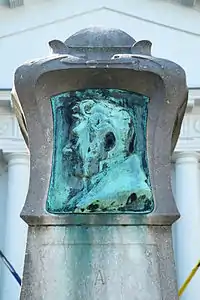 Closeup of the bronze medallion bearing Frédéric de Mérode's image