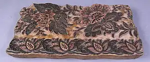 Wooden block for printing chintz, 18 century. Museum of the History of Barcelona.