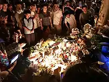 Local citizens mourning two school kids killed outside Shanghai World Foreign Language Primary School on June 28th, 2018.