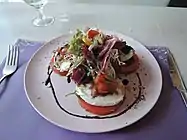 Mozzarella and tomato with vegetable salad