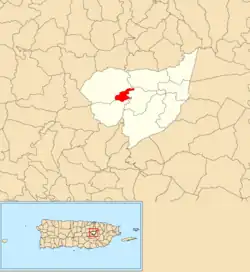 Location of Mulita within the municipality of Aguas Buenas shown in red