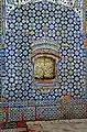 The shrine is covered in blue tile-work that is typical of Multani style.