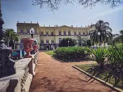 Fire-damaged facade of the palace completely restored, September 2022. View from the new garden