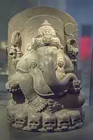 Stone Ganesha, sitting on a ring of skulls