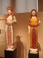 Alternative reconstructions of the Peplos Kore displayed at the Athens show