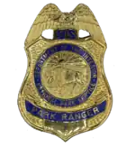 The badge of a National Park Service Law Enforcement Ranger