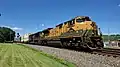 The Reading Railroad heritage unit, EMD SD70ACe #1078, leads an eastbound intermodal on track 2