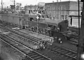 An NS 6000 with carriages near the yard on the east side of  Amsterdam C.S. (13-12-1940)