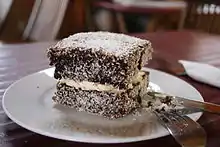 A cream-filled lamington