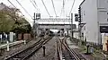 The station viewed from the level crossing at the east (Ikebukuro) end in April 2016