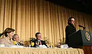 President George W. Bush, Laura Bush, and Sen. Mark Pryor (D-Ark.) break out in laughter as Bono speaks during the National Prayer Breakfast at the Washington Hilton, 2006.