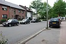 The border between the Netherlands (right) and Germany (left) is located in the center of this residential road, and, nowadays, completely unmarked.