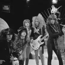 New York Dolls on TopPop in 1973. From left to right: Johnny Thunders, Sylvain Sylvain, Jerry Nolan, Arthur Kane, and David Johansen.