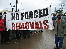 Banner reads "No forced removals"