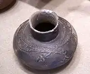 A pot from the Nodena site with Horned Serpents in the shape of an ogee motif