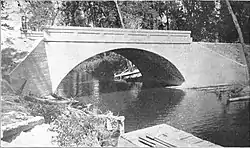 Arch bridge over a body of water