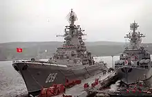 Marshal Ustinov (right) alongside the Kirov-class battlecruiser Kirov