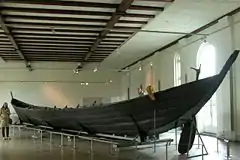 The Nydam oak boat, a ship burial from the Roman Iron Age. At Gottorp Castle, Schleswig, now in Germany.