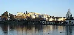 A view towards the Grand Avenue side of Lake Merritt. The apartments in view are part of the Adams Point neighborhood and are typical of the dense housing found in the area.