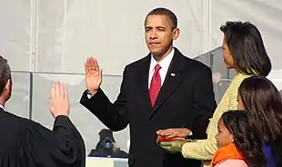 Barack and Michelle Obama, their children, and Chief Justice John Roberts