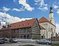 A timber-framed house and the Holy Trinity Church