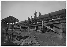 Child laborers on a minecart at Bessie Mine, Alabama, c. 1910-1911.  Photo by Lewis Hine.