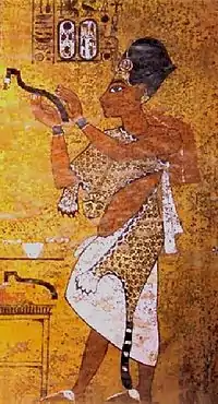 Pharaoh Ay performing the Opening of the Mouth ceremony on his predecessor Tutankhamen. He is wearing the Leopard skin worn by Egyptian High Priests and a Khepresh, a blue crown worn by Pharaohs.