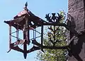 An old ornate light on the stables