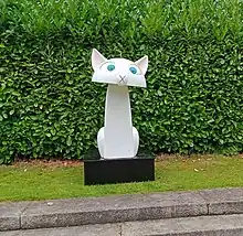 Sculpture of the character Pángúr Bán from the film 'The Secret of Kells' in the Kilkenny Castle Rose Garden