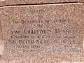 Plaque affixed to the base of the memorial statue for Russell on the grounds of the University of Sydney