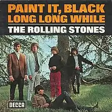 The band members are in a grassy area. The standing row has Charlie Watts, Mick Jagger, Brian Jones and Bill Wyman. Laying down in front of the others with his head resting against Mick Jagger's left leg is Keith Richards. The title of the song, "Paint It, Black", and its UK B-side, "Long Long While" are in orange text with a black background on the top of the cover. Below a white horizontal line (still with the black background) is the band name, "The Rolling Stones", in white text.