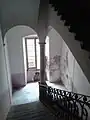 Staircase with column in Carrara marble